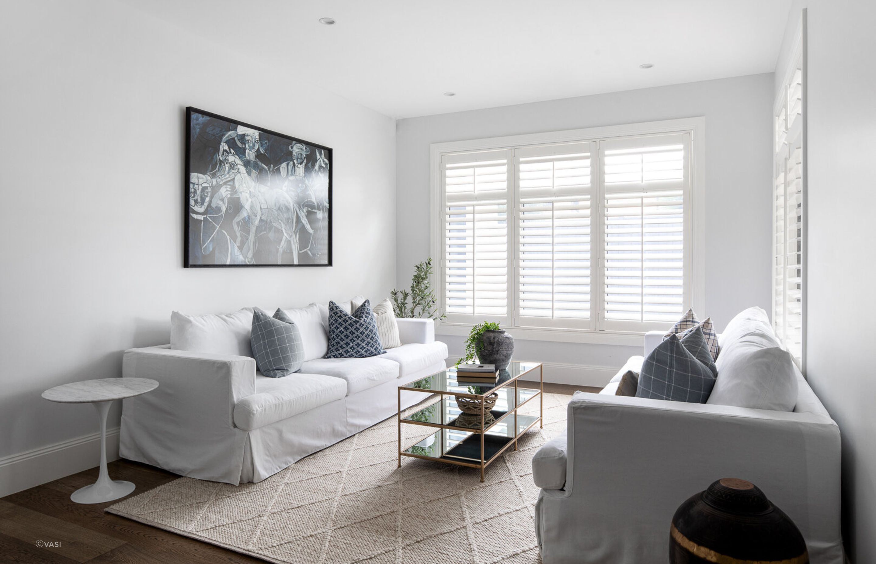 A neutral colour palette is the foundation of this living room. Project: Hamptons House by Vasi. Photography: Dylan James.