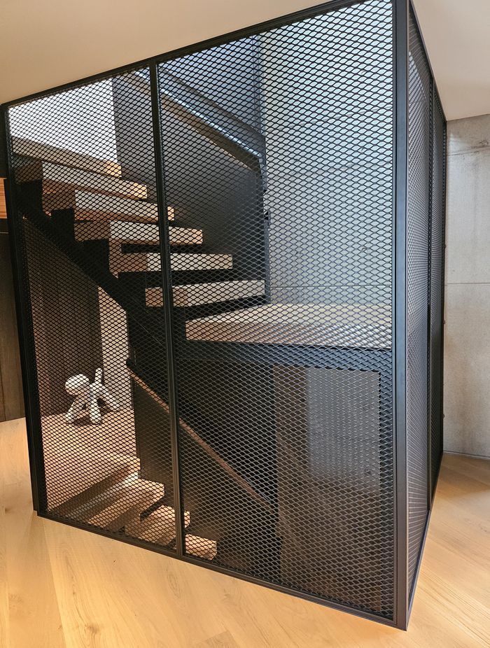 Mesh inserts create an industrial feel.