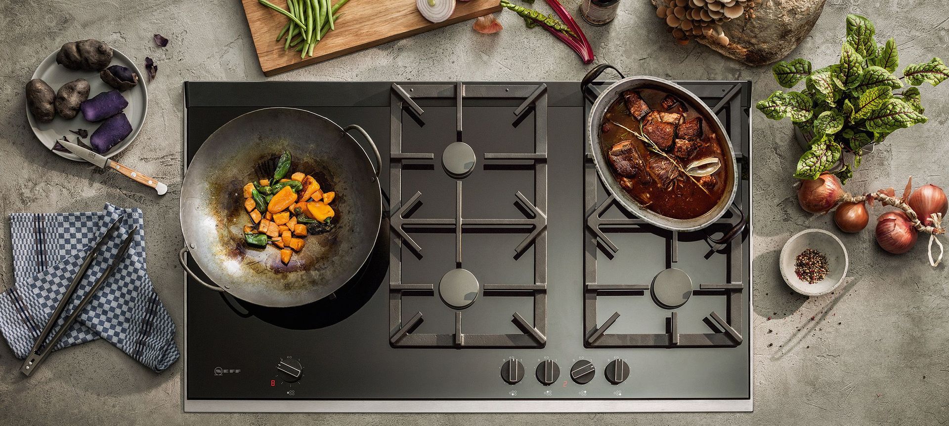 The NEFF Gas Cooktop 90cm in Ceramic Black Glass.