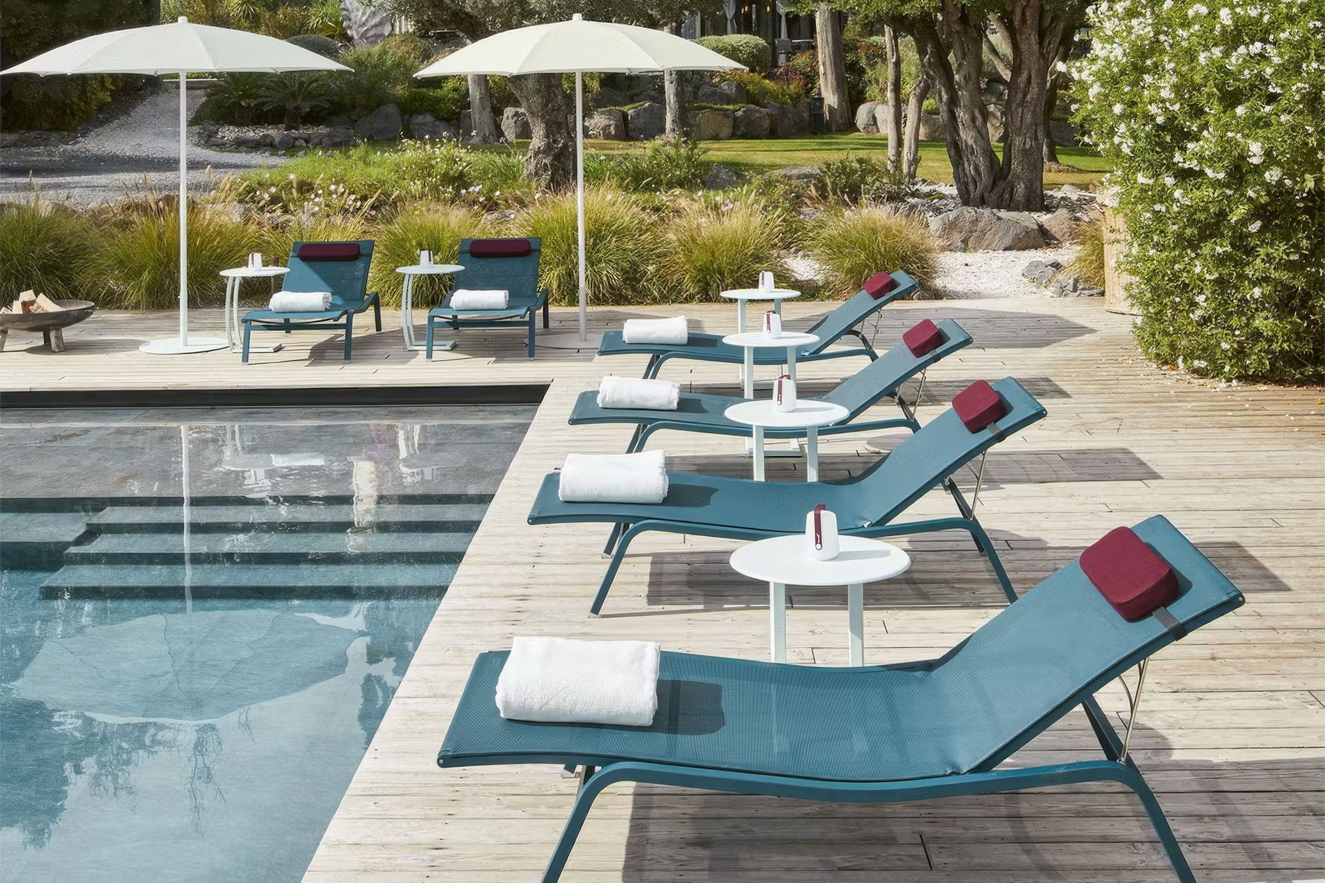 Cool, breathable and weather-ready - Batyline fabric is perfect for poolside comfort and coastal living.