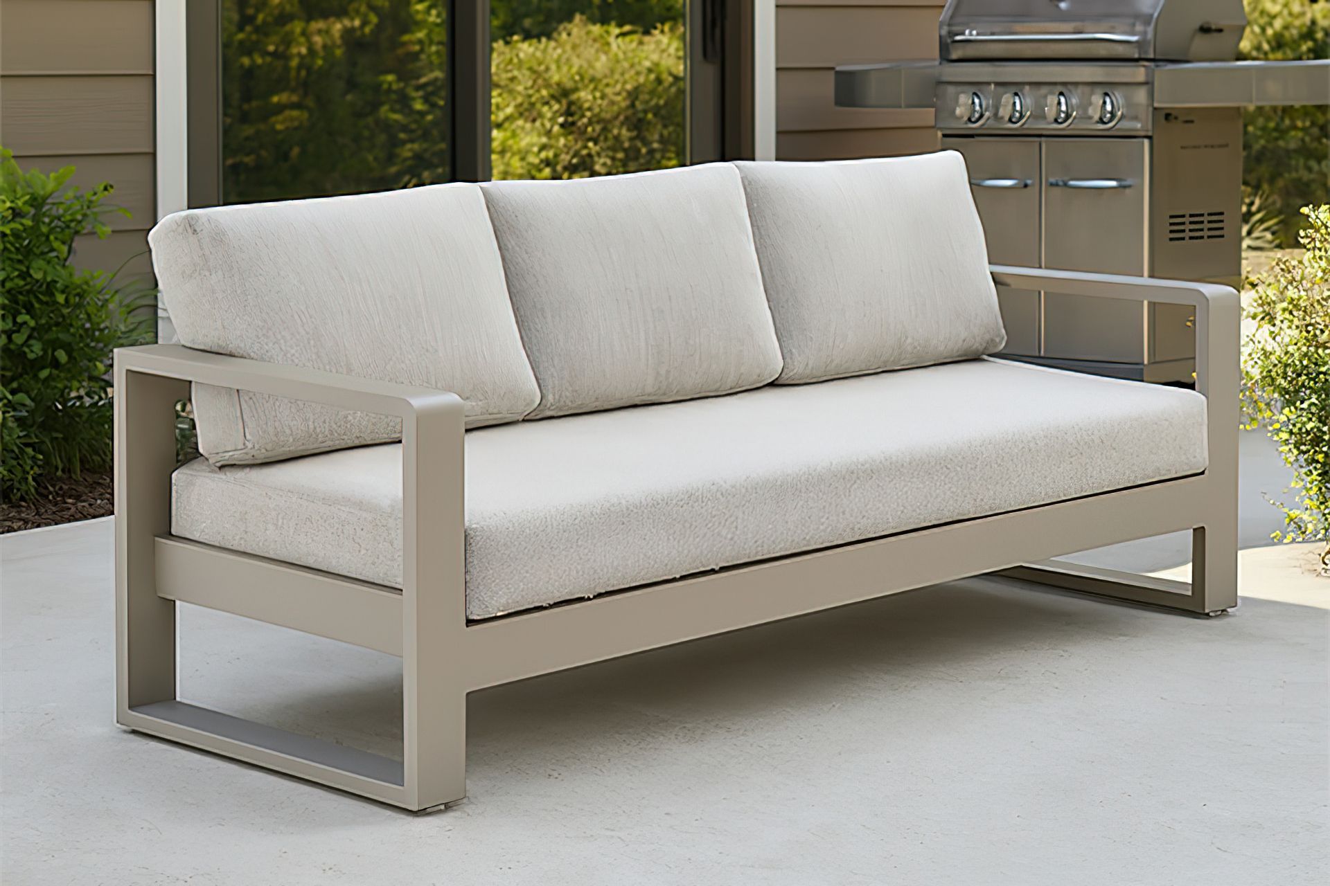 A-modern-outdoor-sofa-with-a-sleek-beige-metal-frame-and-thick-light-grey-cushions-2.jpg