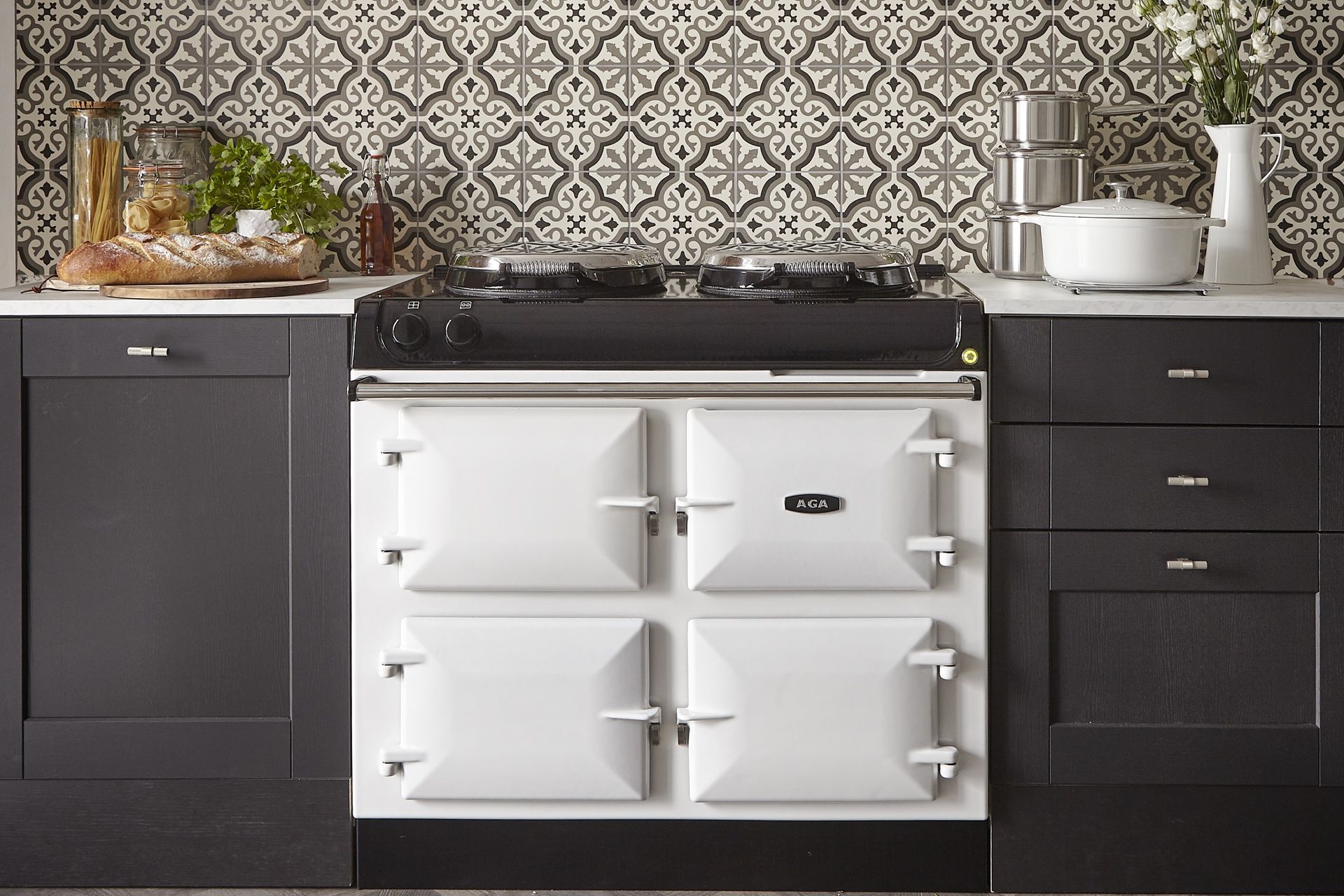 Economically runs on gas and cooks using radiant heat — the exquisite AGA 3-Oven Dual Control Cast Iron Oven.