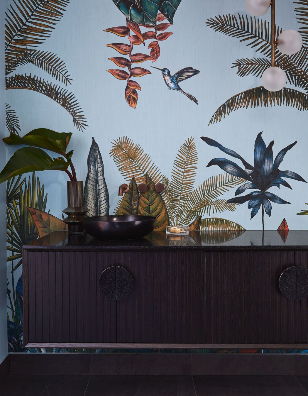 Printed wallpaper is a great way to achieve the mural look that will be popular this year.