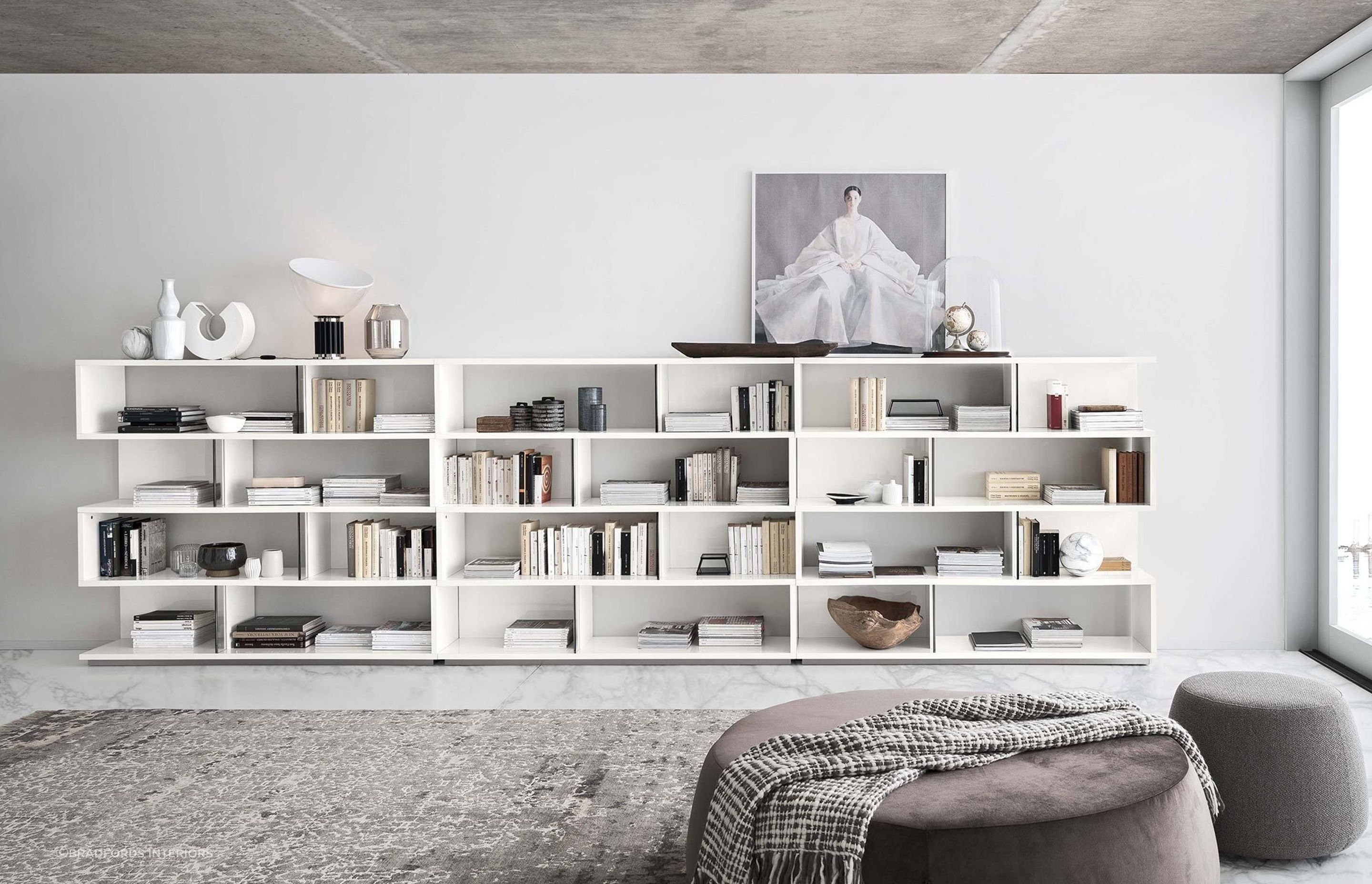 A balance of books and art can make for a magnificent display, especially with a spectacular bookcase like the Artemide Bookcase by Alf Italia.