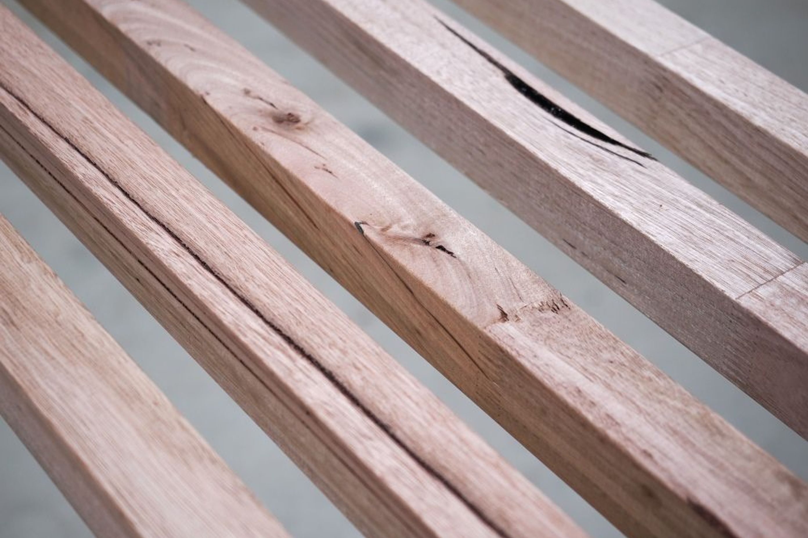IronAsh batten profile. Full thickness gum pockets, knots, gum vein, pin hole, hobnail, grain orientation, splits and spring tear present are all examples of grade expectations.