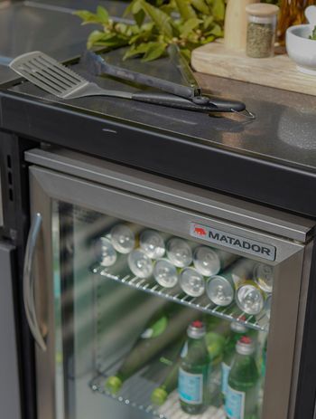 A sophisticated bar fridge is a must for any outdoor kitchen