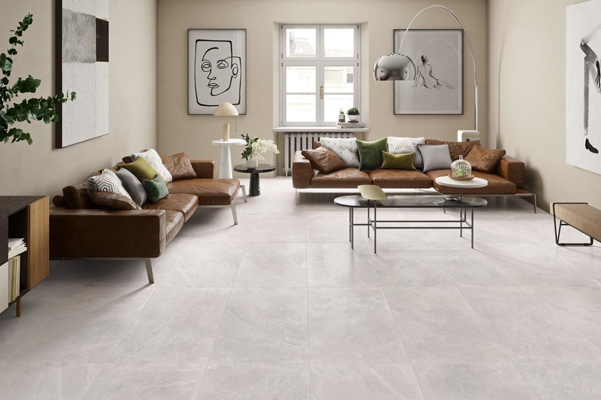 Large tiles like the Gentle Stone-Marble by Ascot add a seamless quality to a living space.