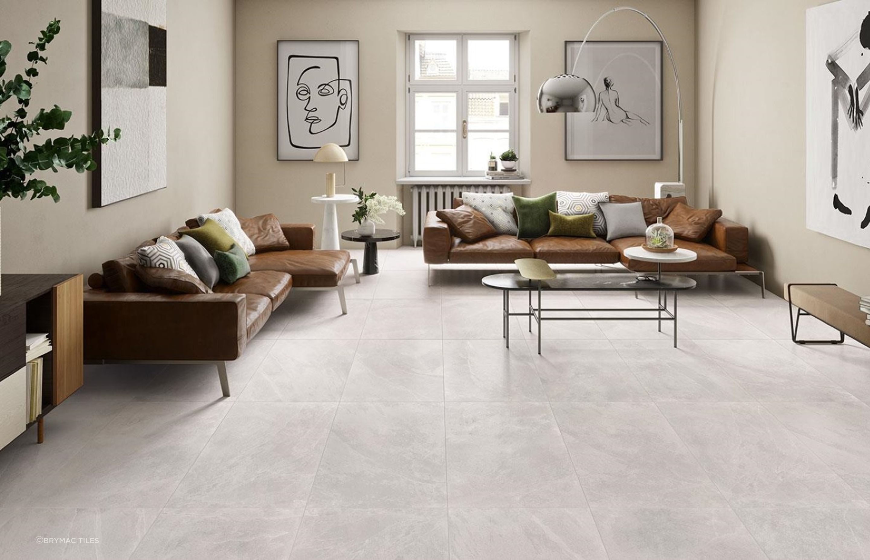 Large tiles like the Gentle Stone-Marble by Ascot add a seamless quality to a living space.