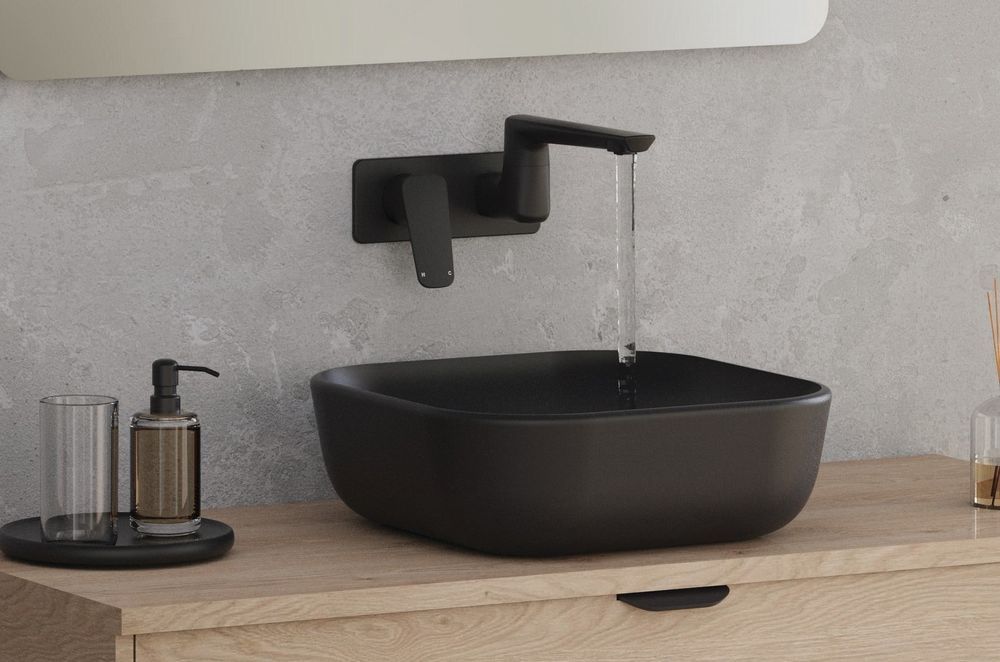 The Axiss II Wall Mounted Swivel Basin Mixer is enhanced by a Titan PVD strong and durable coating giving great longevity.