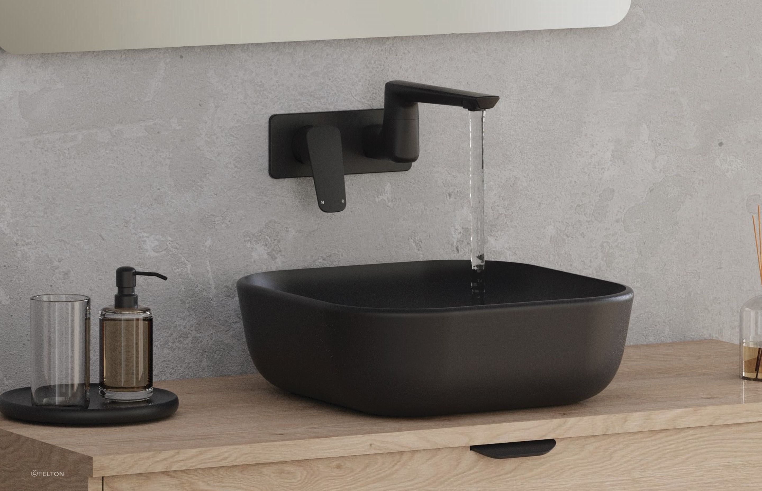 The Axiss II Wall Mounted Swivel Basin Mixer is enhanced by a Titan PVD strong and durable coating giving great longevity.