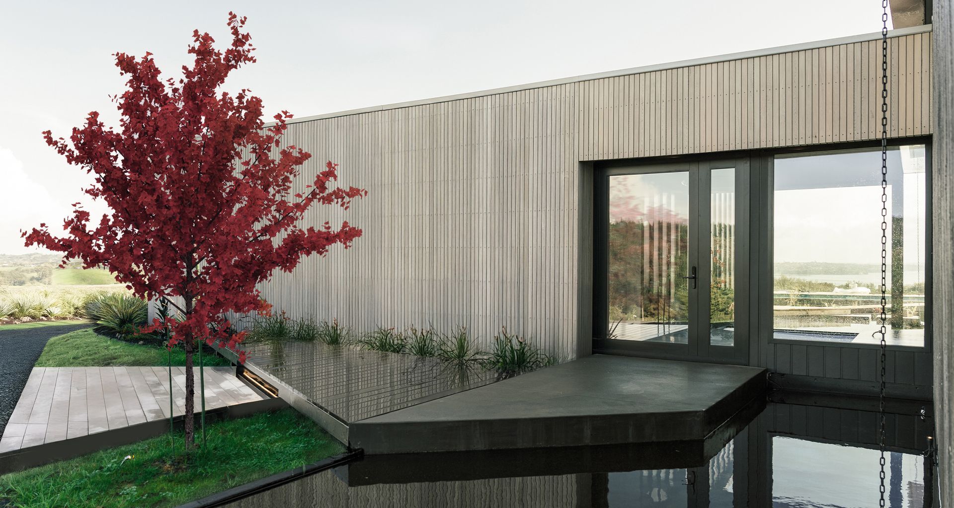 Azeem House is conceived around the layered rhythms of multi-generational living, balancing shared spaces, private retreat and moments of quiet ceremony within a coastal setting.
Architecture: Construkt Architects
Photography: Calvin Hui