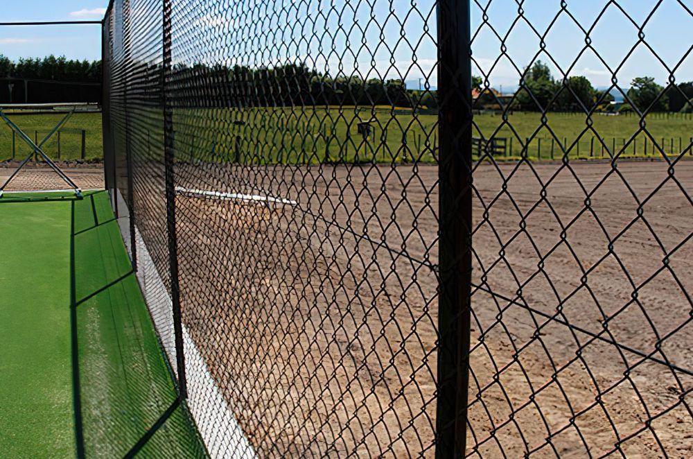Functional but highly effective, there are plenty of applications for chain link fencing, seen here featuring Bayonet Chain Link Netting.