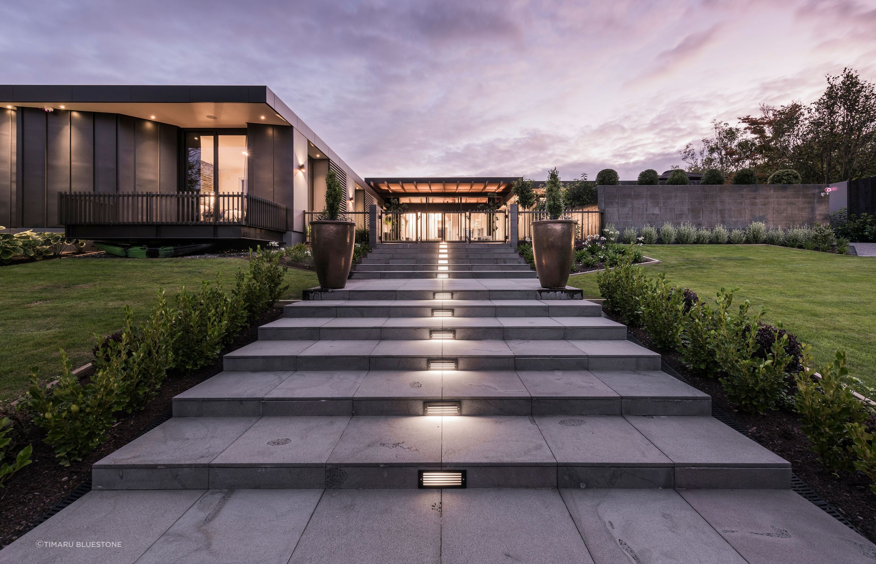 Stylish outdoor stairs with Bluestone Treads in this immaculate property.