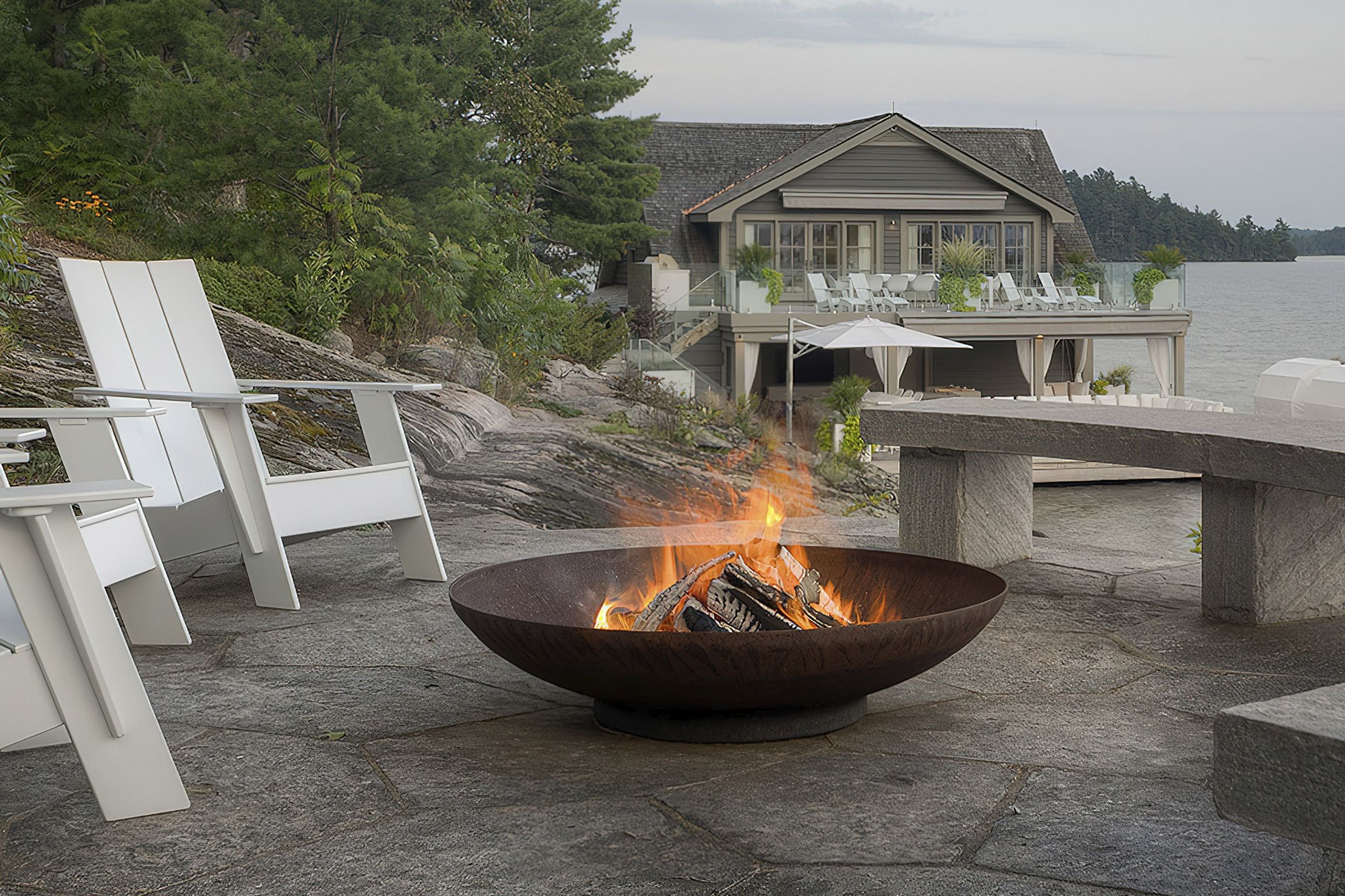 The fire bowl design, like the Bol Corten Fire Bowl, is a chic on-trend choice for 2024.