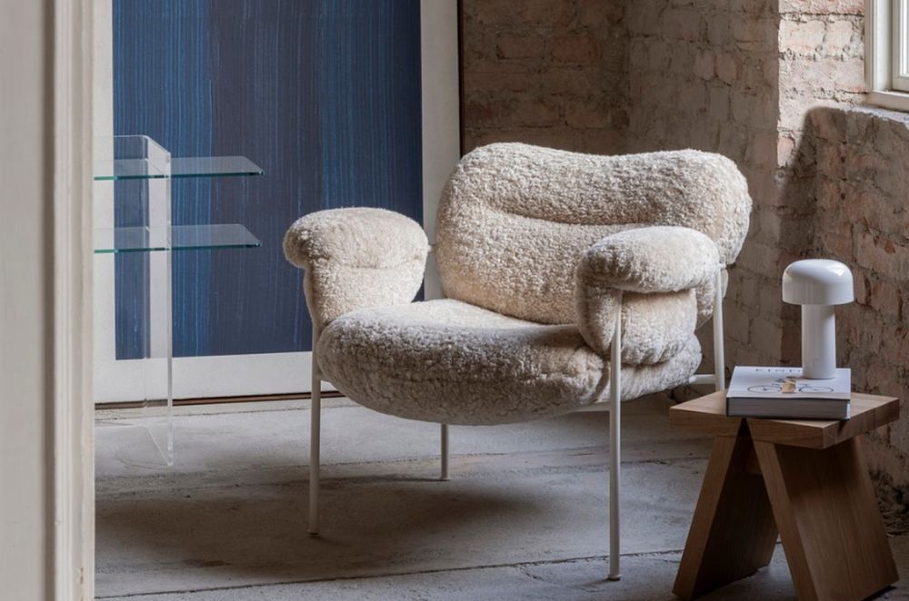 The beautiful Bollo Armchair in Sheepskin is a perfect example of a textural accent chair for a space.