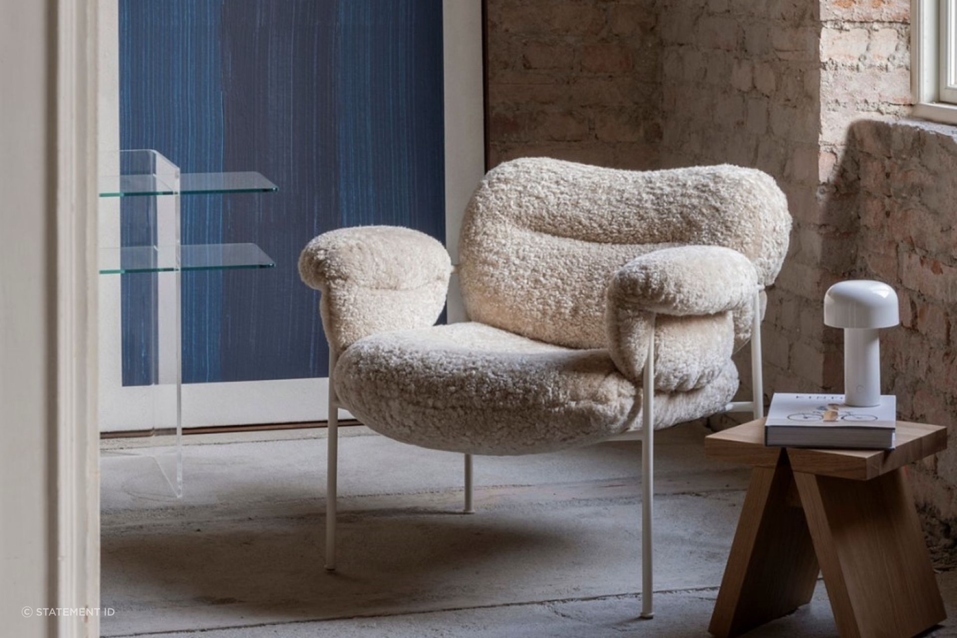 The beautiful Bollo Armchair in Sheepskin is a perfect example of a textural accent chair for a space.
