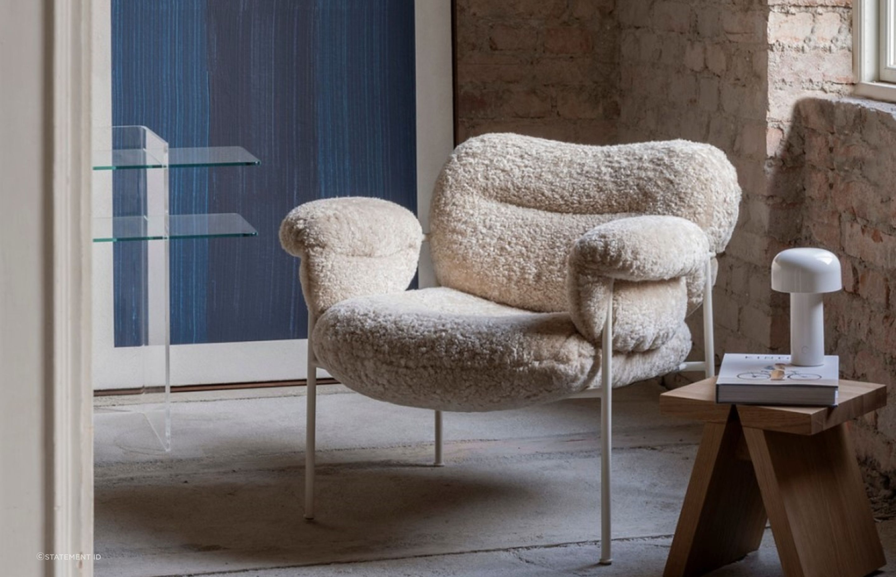 The beautiful Bollo Armchair in Sheepskin is a perfect example of a textural accent chair for a space.