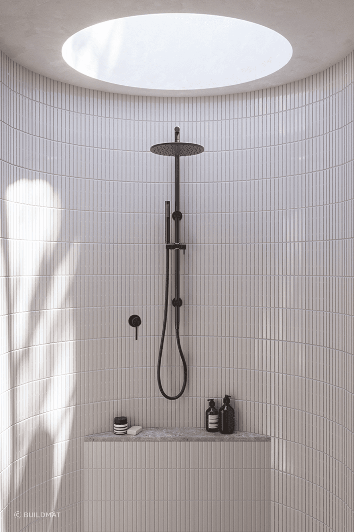 A stunning walk-in shower and a stunning product — the Mira Brushed Gunmetal Shower Rail Twin Set from Buildmat.
