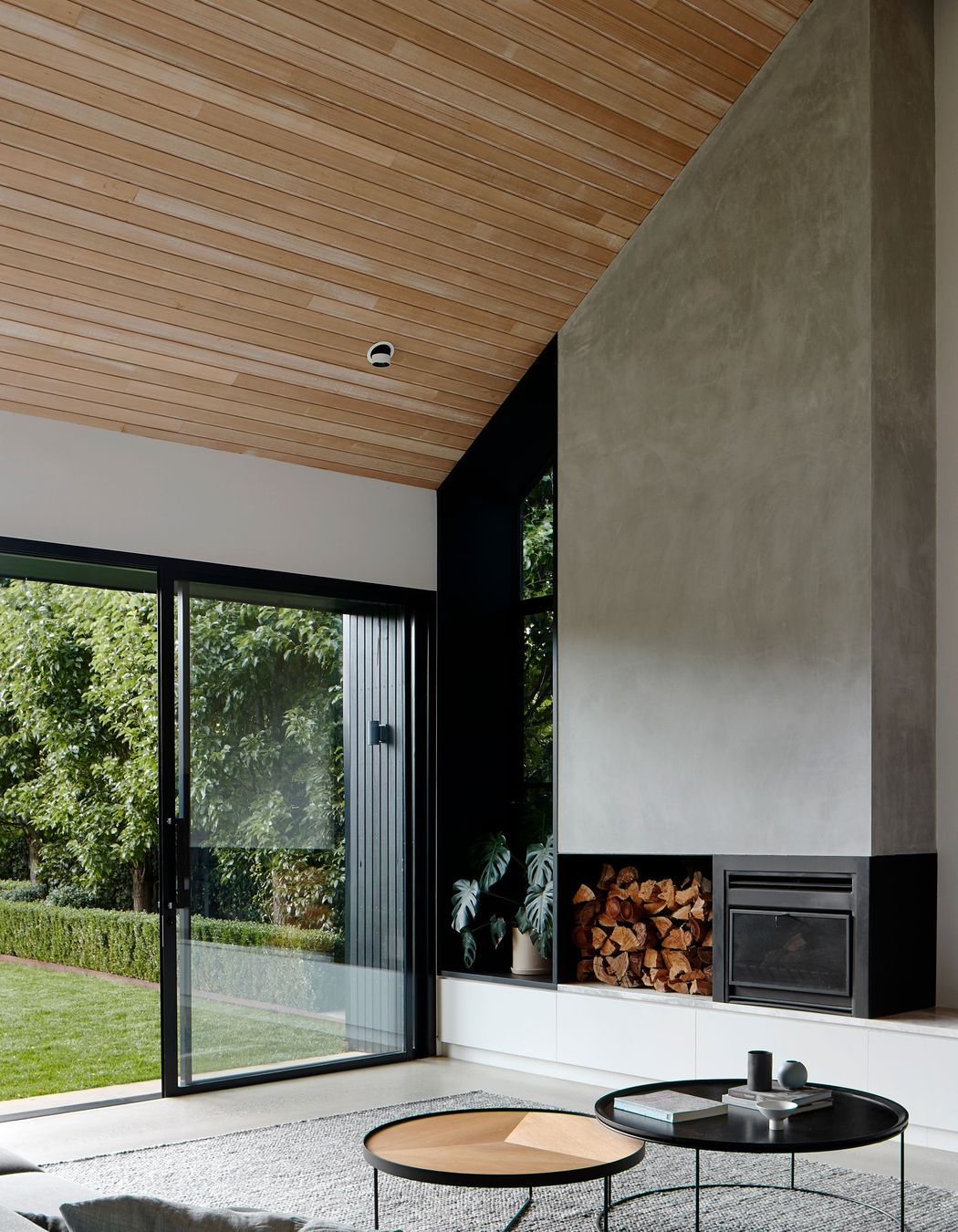 A cosy wall hole provides a great fire wood storage space. Photographer: Shannon McGrath.