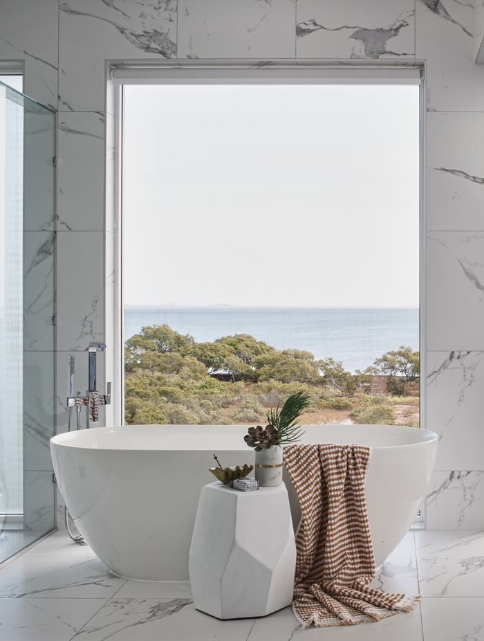 The perfect view for a coastal style bathroom.