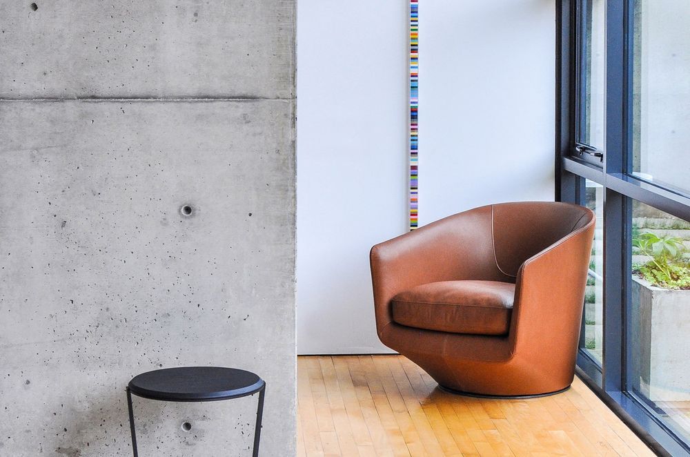 Leather is a great material for accent furniture, showcased superbly here with the Bensen U Turn Chair.
