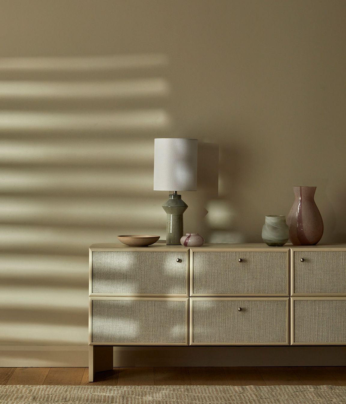 Pictured: Elodie Buffet, Lorne Post Table Lamp, Hanson Eden Set of 3 Bowls, Boden Stripe Bud Vase, Stripe Bottle Vase & Pearl Vase, Bower River Rug (Natural)
