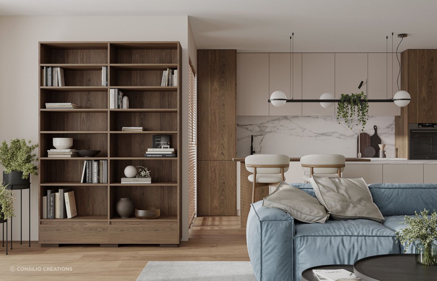 A mix of books, art and sculptural pieces imparts a pleasing balance in a space, as seen here with this bookcase by Consilio Creations.