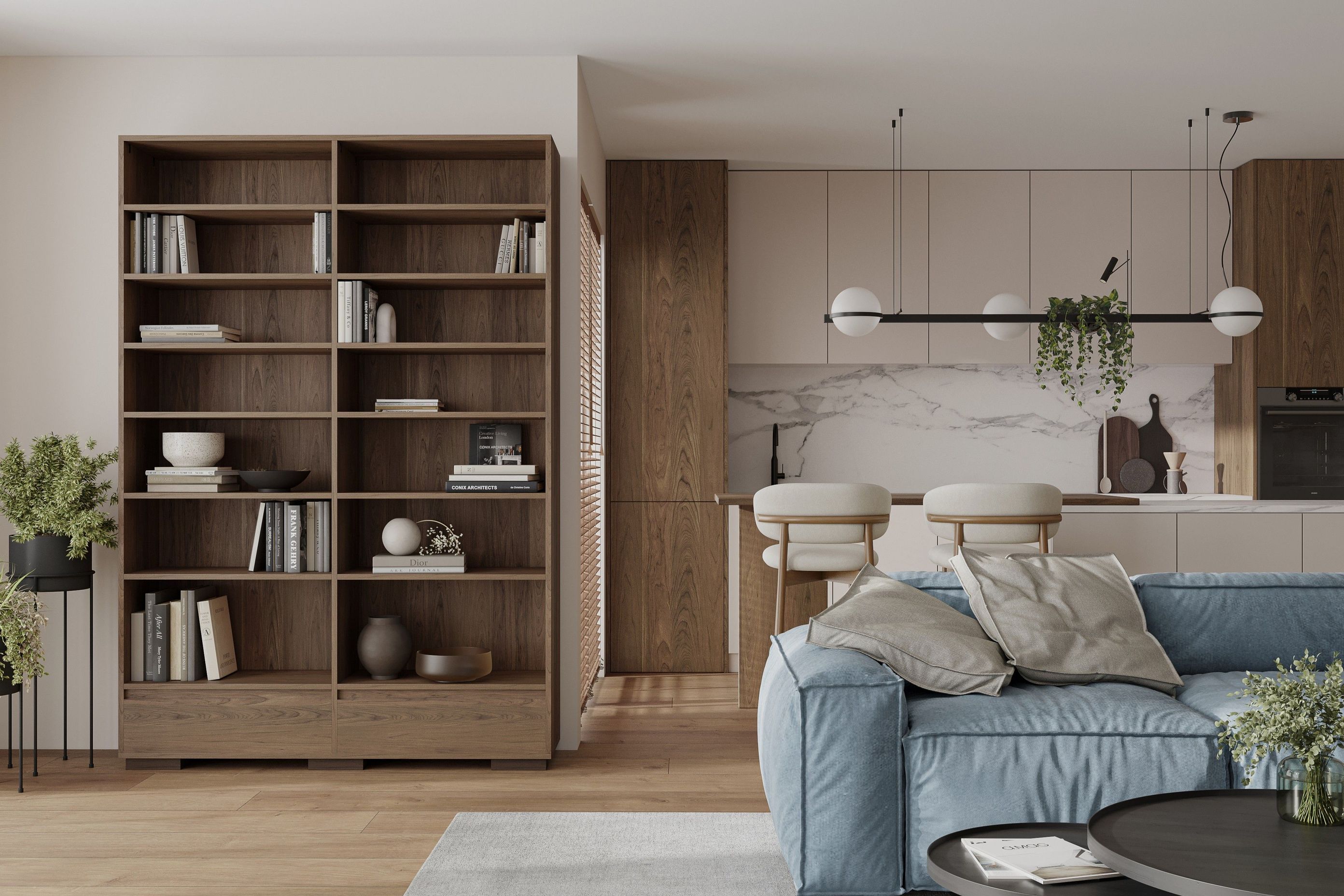 A mix of books, art and sculptural pieces imparts a pleasing balance in a space, as seen here with this bookcase by Consilio Creations.
