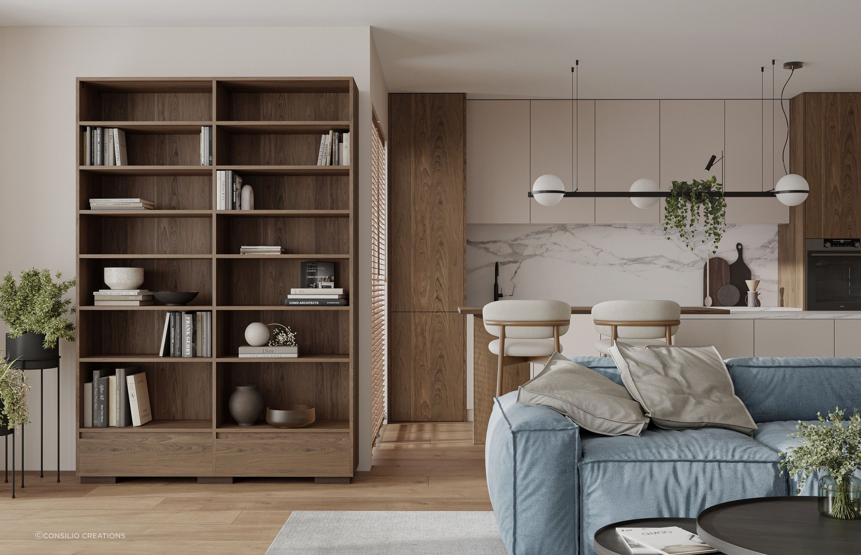A mix of books, art and sculptural pieces imparts a pleasing balance in a space, as seen here with this bookcase by Consilio Creations.