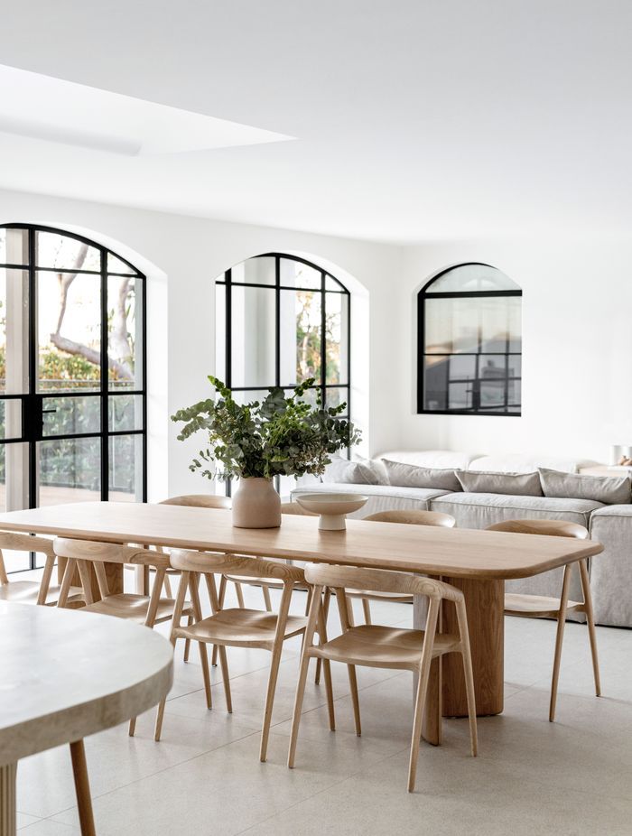 The arched windows and doors in the contemporary build needed precise building skills to execute.