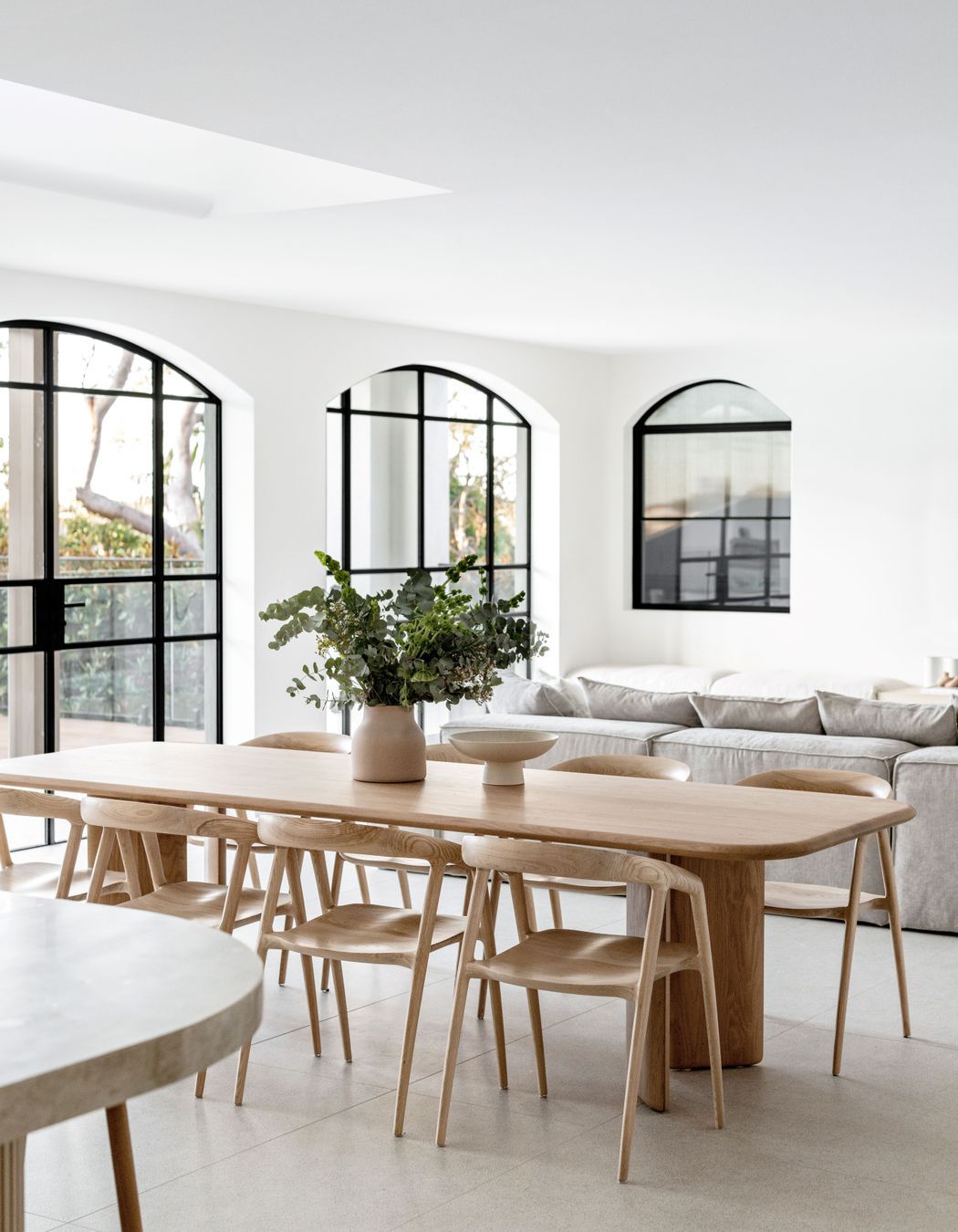 The arched windows and doors in the contemporary build needed precise building skills to execute.