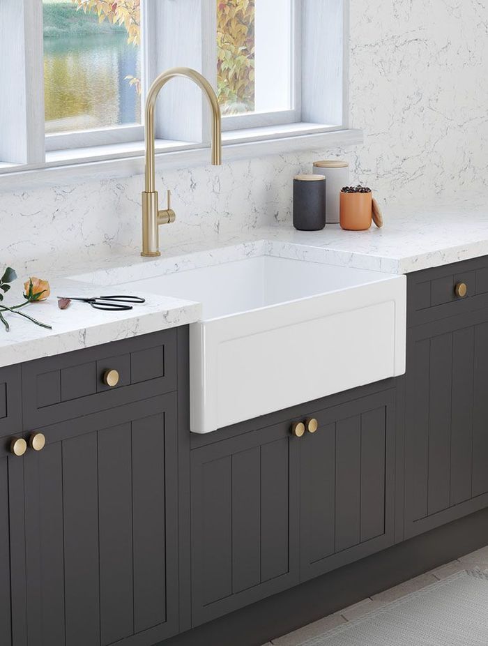 Farmhouse sinks, characterised by their exposed front apron, merge traditional charm with deep basins, making them both a stylistic statement and a practical choice for handling large kitchenware.