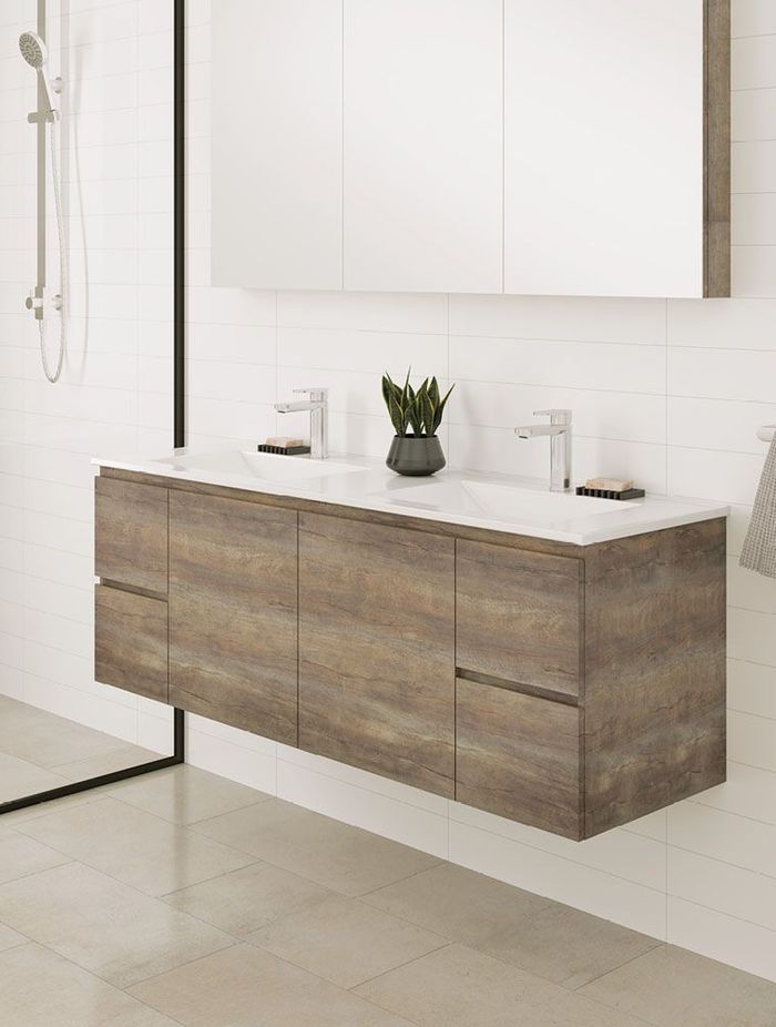 The natural woodgrain finish of the Carmen Door &amp; Drawer Vanities by Fienza brings a relaxed ambience.