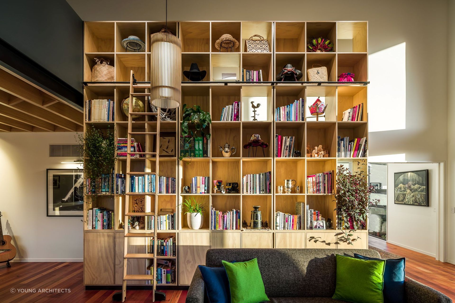 An impressive bookcase like this in this Port Hills home will solve a lot of your storage issues. | Photography: Dennis Rademacher