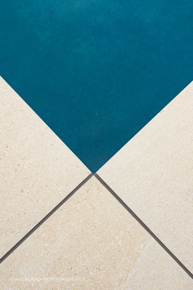 Modernising your pool surrounds with porcelain coping and pavers add both the wow factor and have a very practical place around a pool.