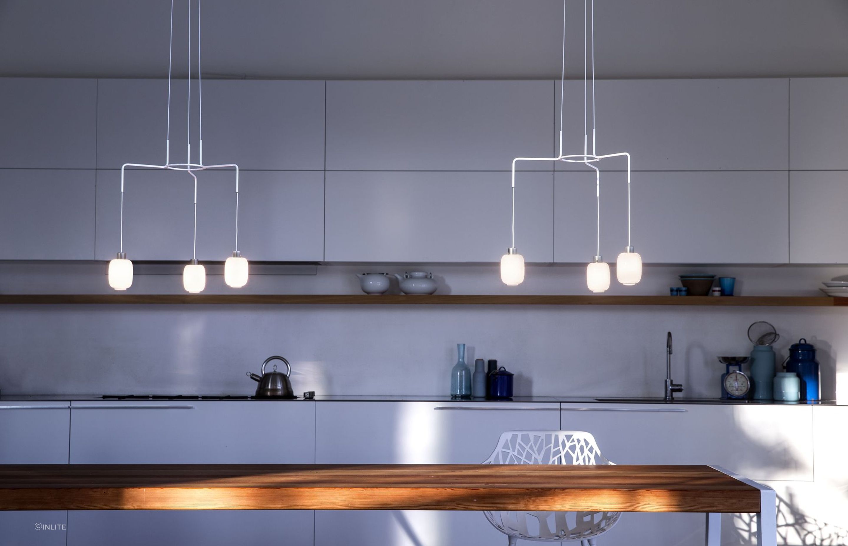 Ensuring your feature lights complement your space is vital, wonderfully done here with the Chan Pendant Light by Prandina.
