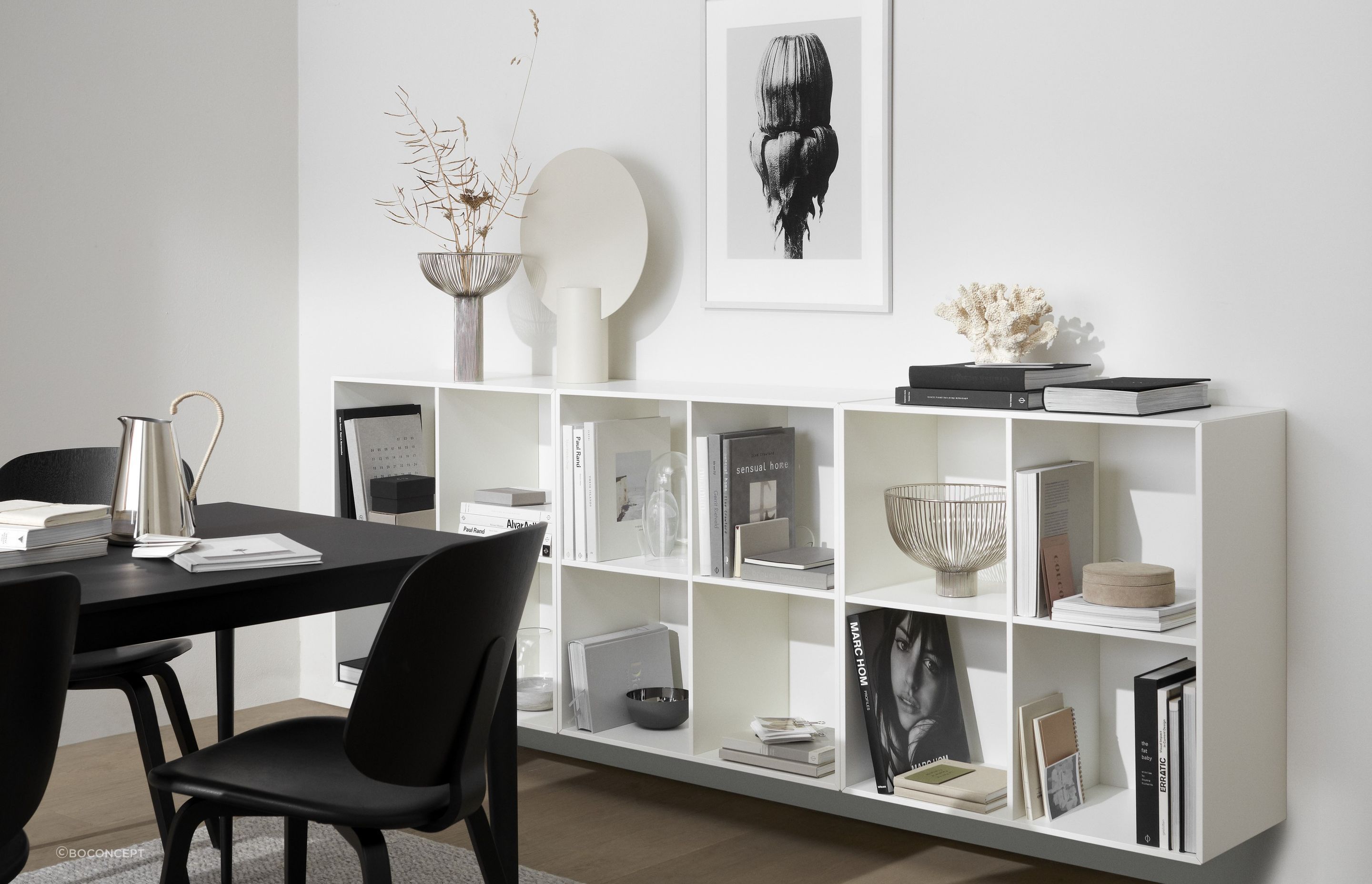 The Como Wall System Bookcase with a few personal inclusions of bookshelf decor.