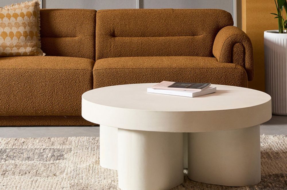A bold approach to accent furniture with the Concrete Tuba Coffee Table.