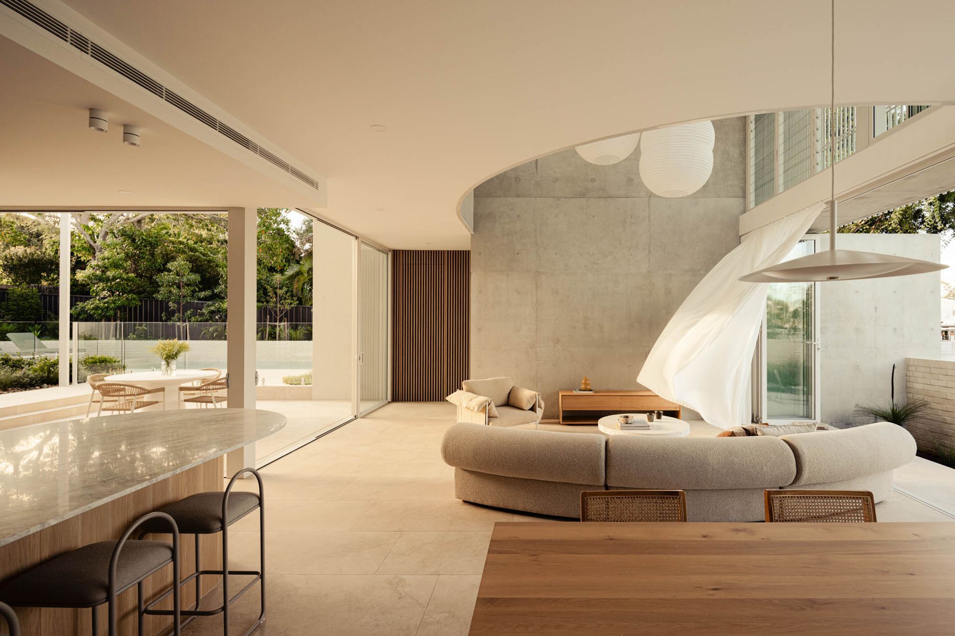 Bairndale Residence by Reitsma & Associates: Natural materials in both interior and exterior spaces create a direct connection with nature.