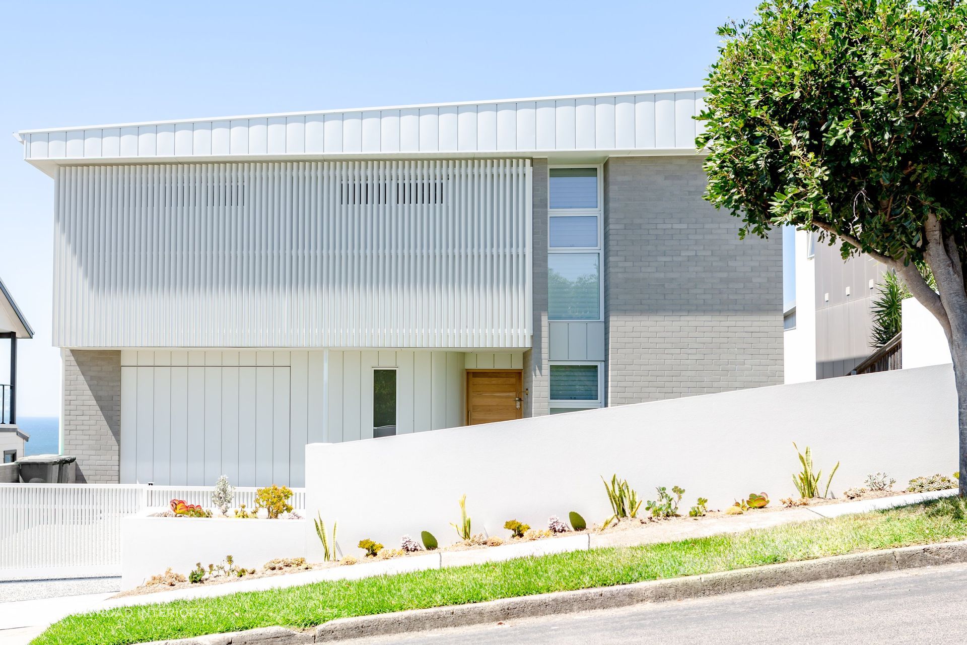 Postioned in an extremely exposed coastal location, this architecturally designed home required well-thought-out construction — built by MADE.