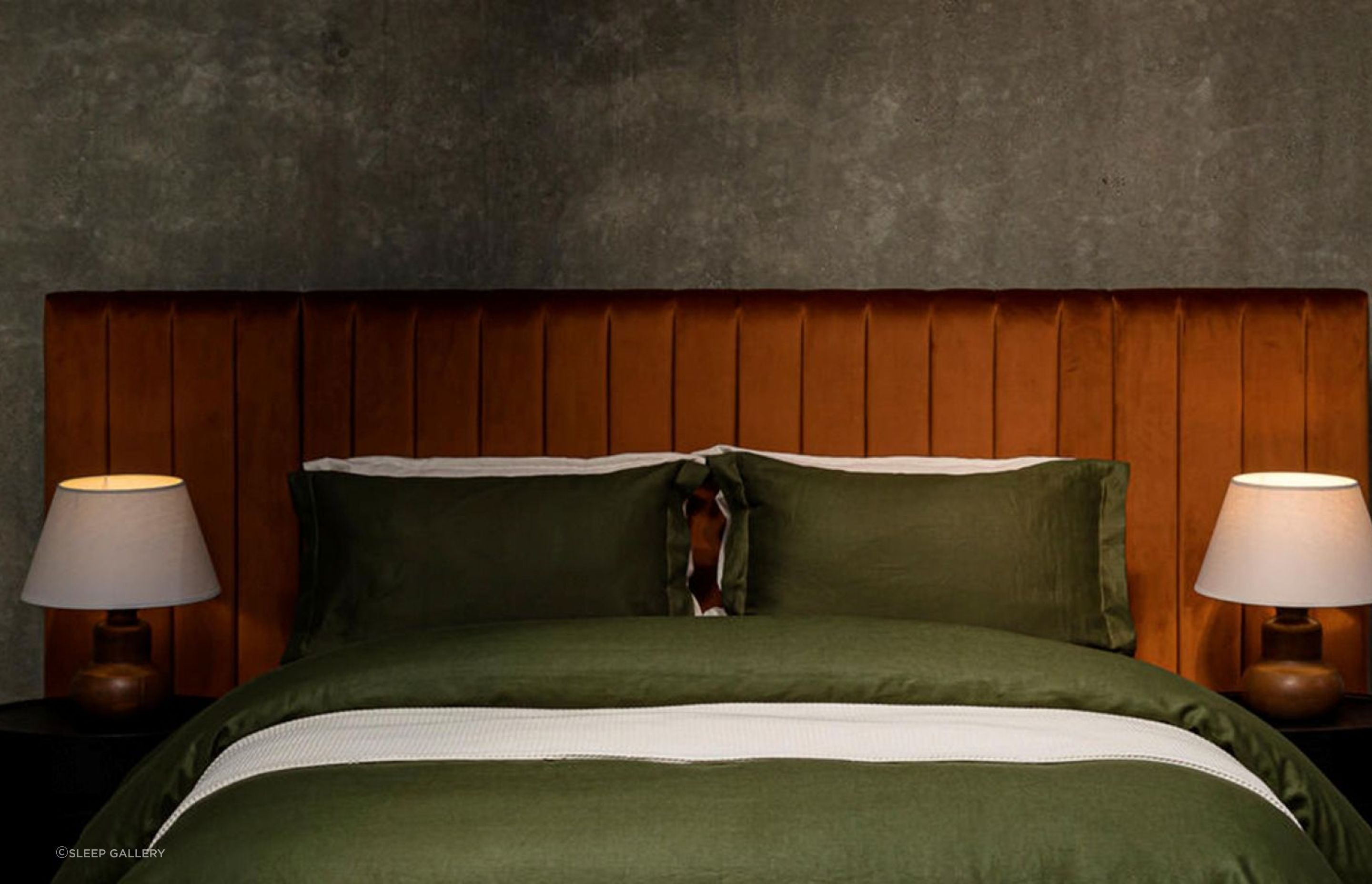 You can draw the eye with a punchy headboard like the Chicago Headboard from Sleep Gallery.