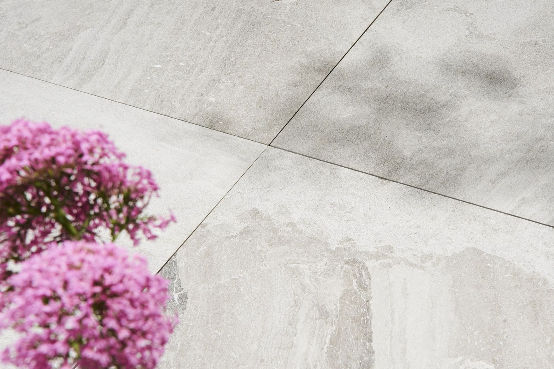 The exquisite natural veins of the Chinchilla Exterior Tile, made from a beautiful grey toned marble from Turkey.