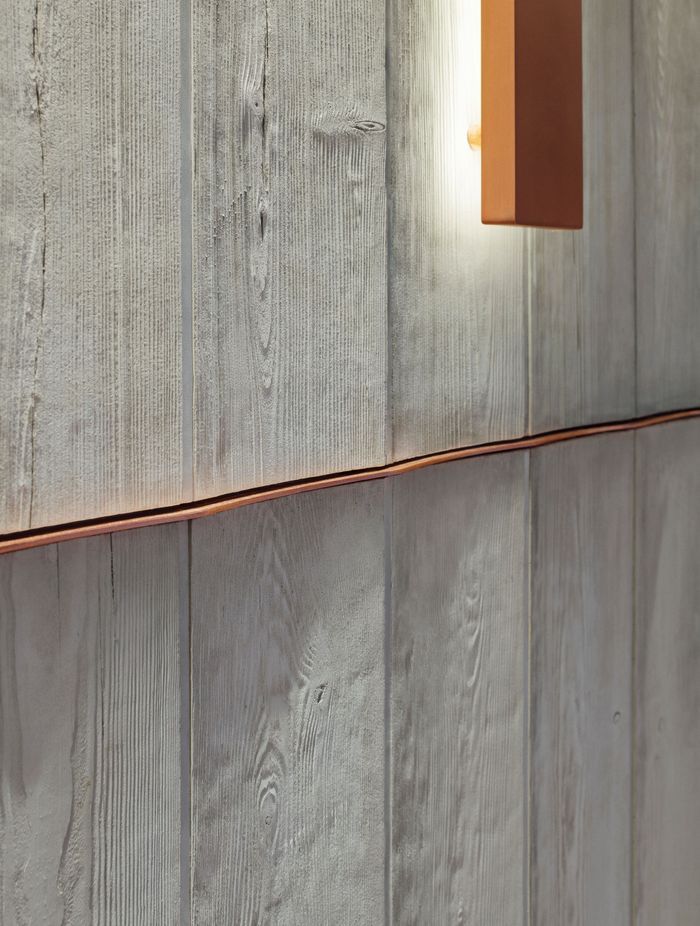 These boards showcase the beauty of natural materials. Featured product: Board Form Concrete Veneer.