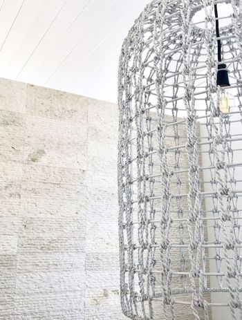 Cream wall cladding in action: modern aesthetic meets warm, soft-textured Crema Alpenia Limestone for an effortlessly contemporary look. Featured product: Cascade Cream Wall Cladding.