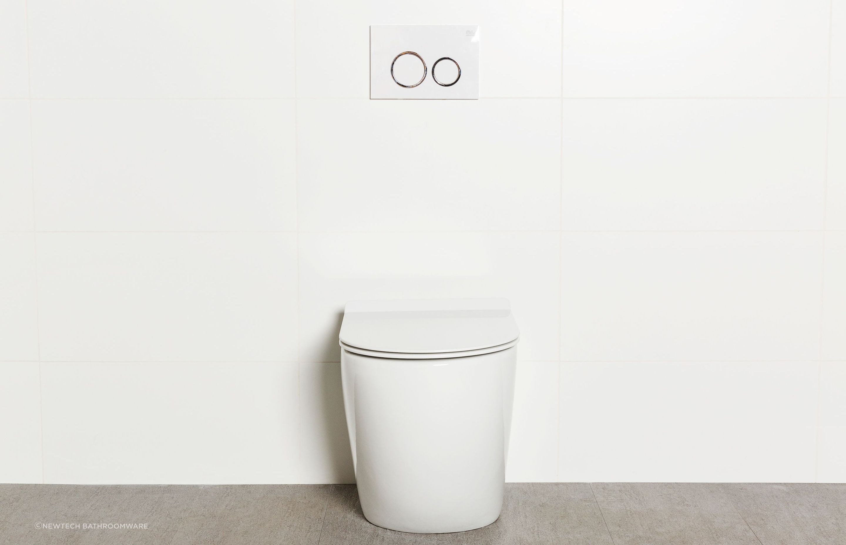 The Milu Odourless Floor Mount Toilet Pan & Cistern comes with a thin, soft-close seat.