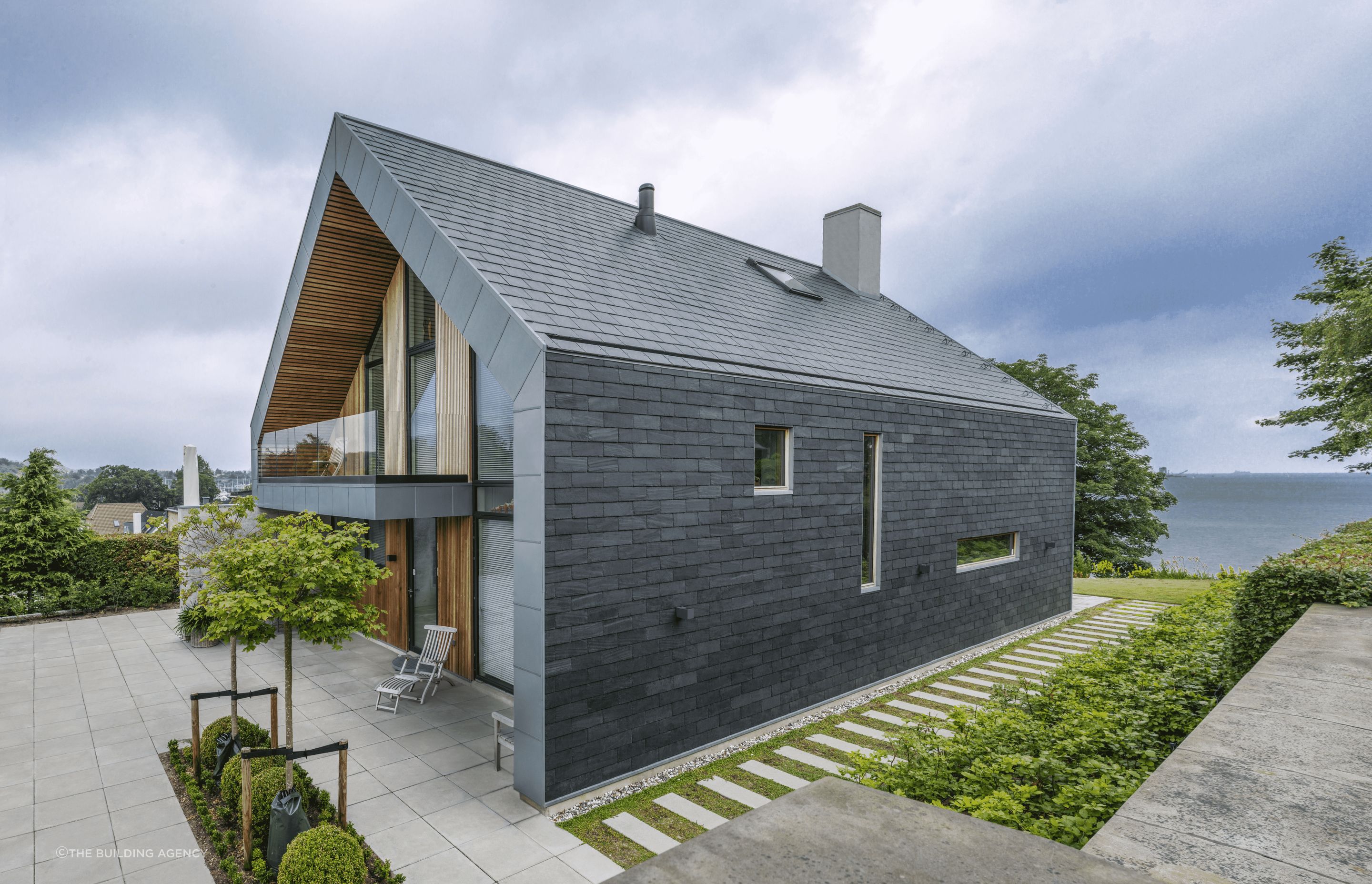 CupaClad natural slate cladding is a contemporary, durable, low-maintenance facade choice for modern homes.