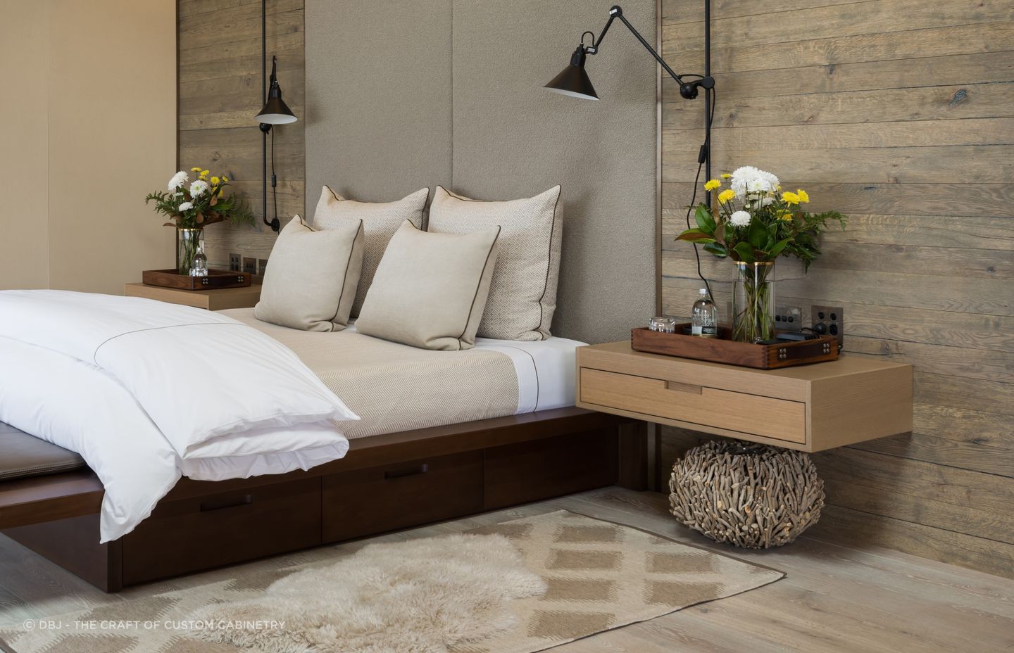 Wall mounted bedside tables, like these custom made bedside tables by DBJ, free up floor space for other items of decor.