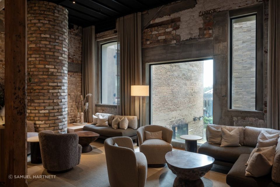 The Libraries bar features a variety of lighting styles, with well-placed floor lamps creating depth and interest in the space.