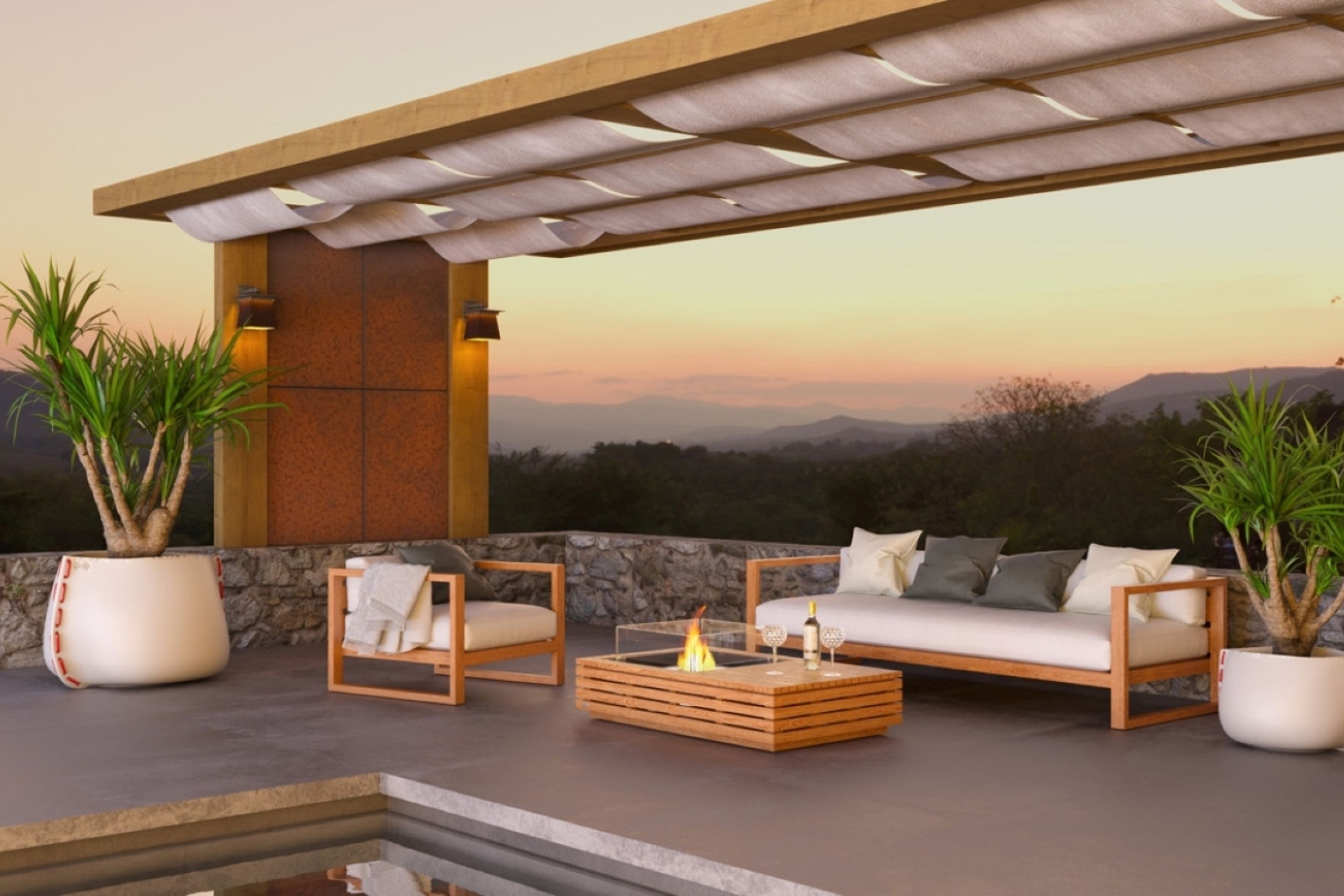 The teak finish of this EcoSmart Manhattan 50 Biofuel Fire gives great warmth to this outdoor space, complemented by matching outdoor furniture.