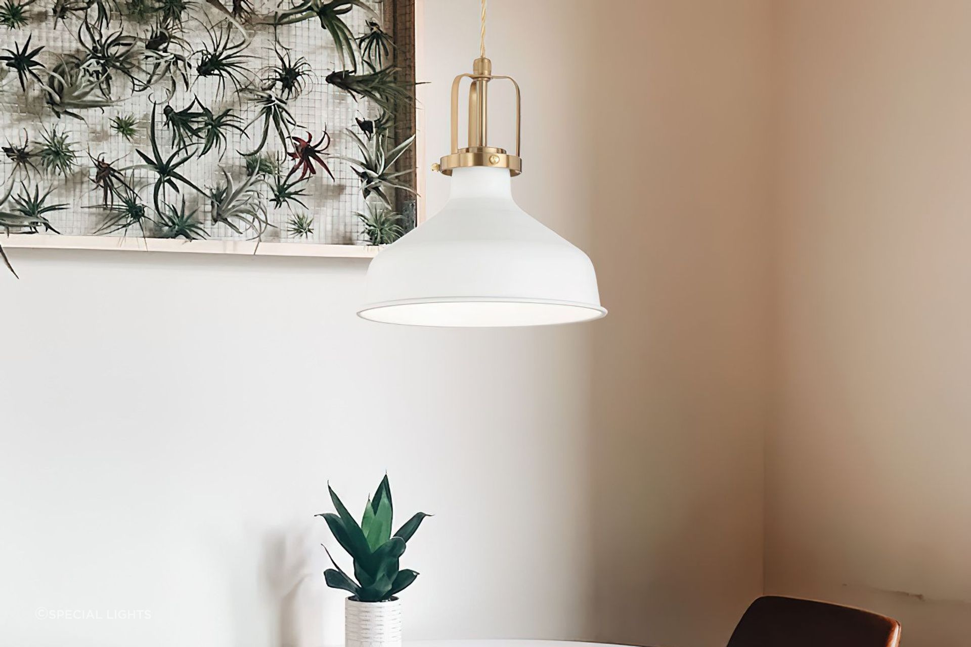 The industrial style shade and braided gold fabric suspension cable are standout features of the Eris 33cm Pendant Light by Special Lights.
